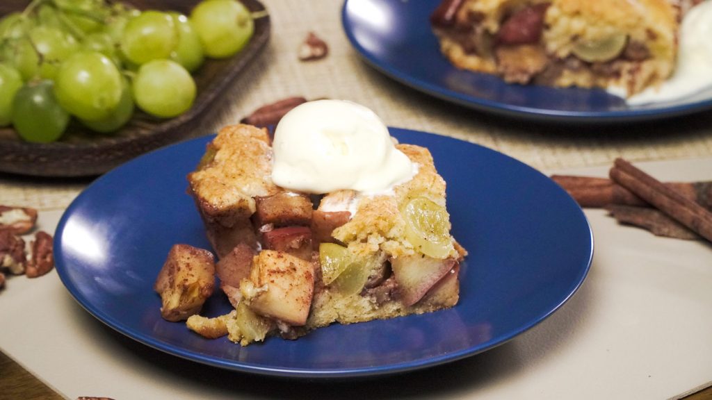 Apple Grape Crumble Recipe, crumble dessert with apples, grapes, and vanilla ice cream topping