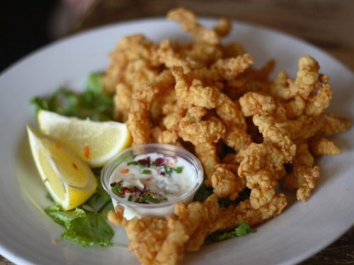 Fried Clam Strips Recipe (Friendly’s Copycat), platter of oven fried crispy breaded seafood clam strips
