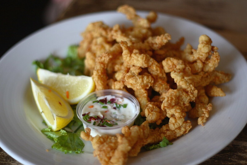 Fried Clam Strips Recipe (Friendly’s Copycat), platter of oven fried crispy breaded seafood clam strips