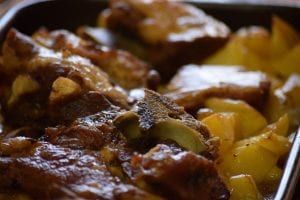 Pork Steak with Seasoned Potatoes Recipe, Cooked pork in brown sauce with potato slices