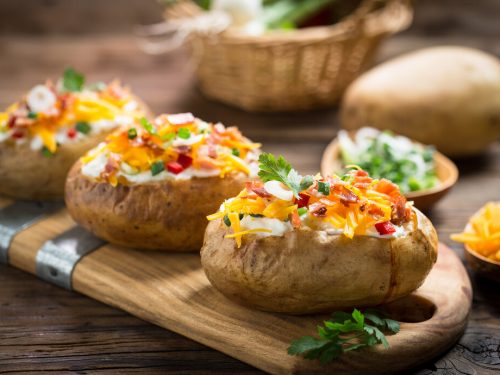 baked potato on grill, grilled baked potatoes with cheese and bacon