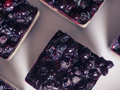 top shot of several blueberry cheesecake squares
