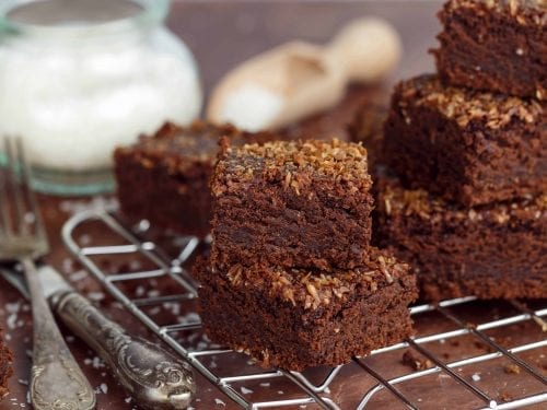 coconut brownies on a cooling rack