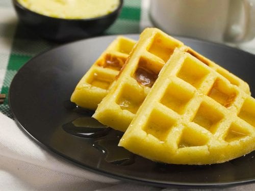 Copycat Waffle House Waffles Recipe, homemade waffles with maple syrup topping