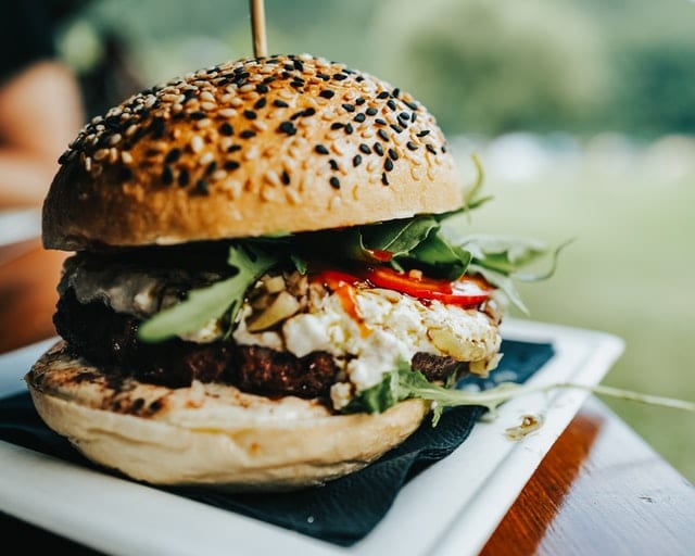 Greek-Style Burgers with Tzatziki Recipe, homemade hamburger with feta cheese and tzatziki sauce