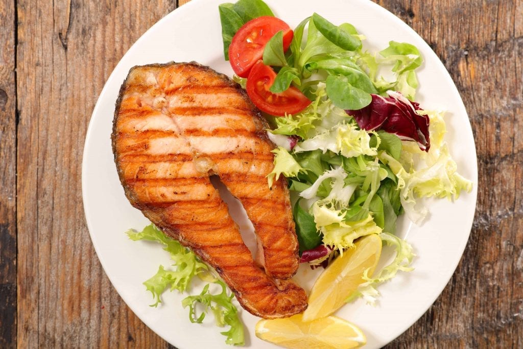 grilled salmon steak with salad