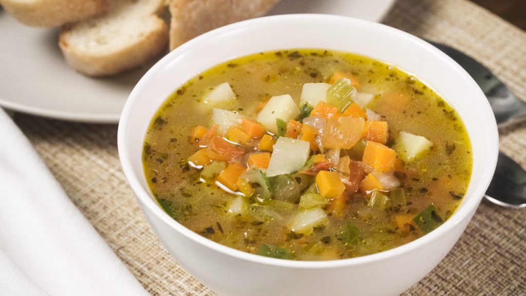 Potbelly Garden Vegetable Soup, Soup with carrots, potatoes, and herbs in chicken broth