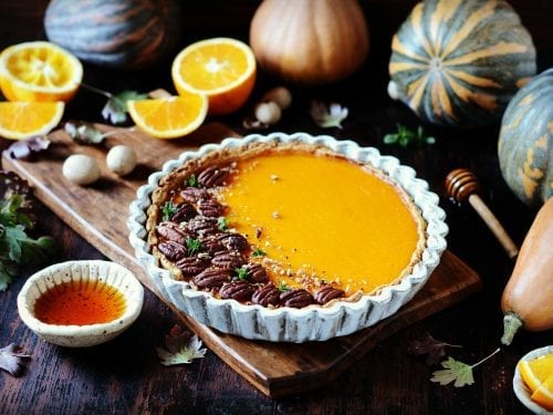pumpkin pie topped with pecans