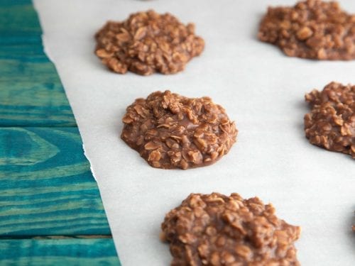 no-bake chocolate peanut butter oat cookies on wax paper