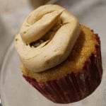 pumpkin cupcake with frosting swirled on top