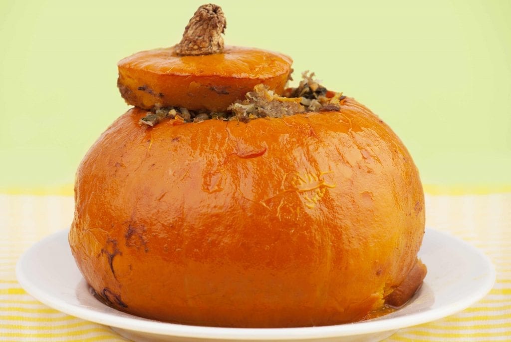 baked pumpkin stuffed with meat, rice and vegetables