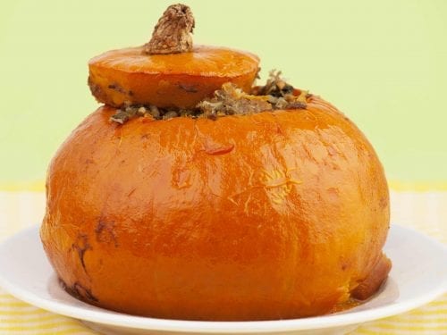 baked pumpkin stuffed with meat, rice and vegetables
