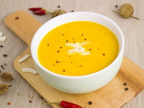 pumpkin soup topped with coconut flakes