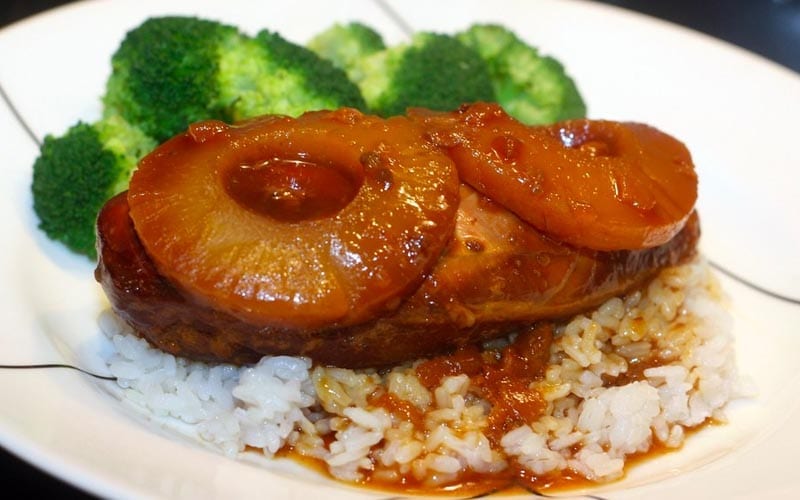 Hawaiian chicken with pineapple chunks over rice