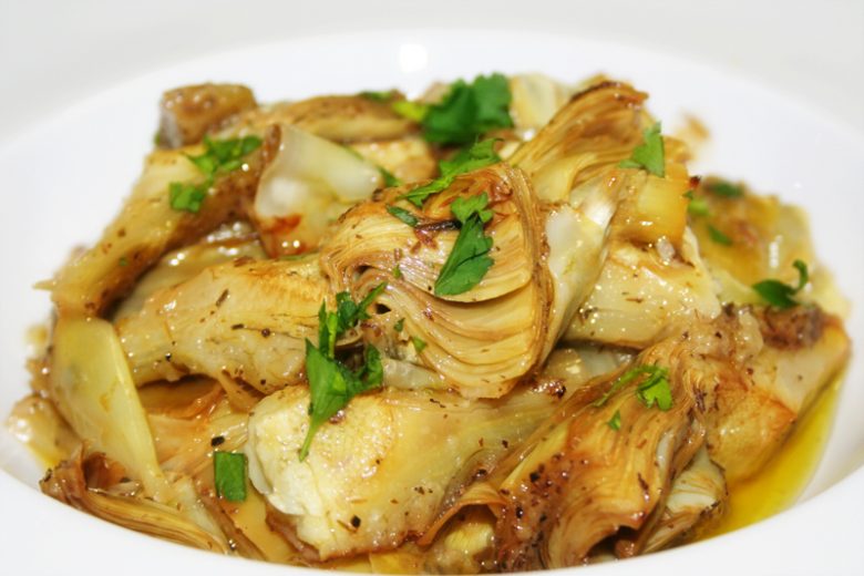 artichokes braised with green onions and sugar snap peas