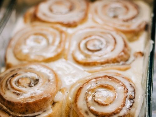 cinnamon rolls in a glass baking dish