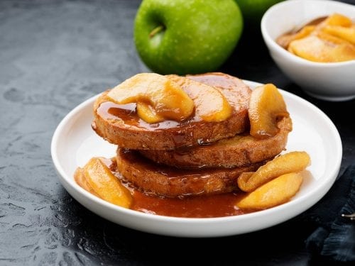 bread covered in caramel and apple slices
