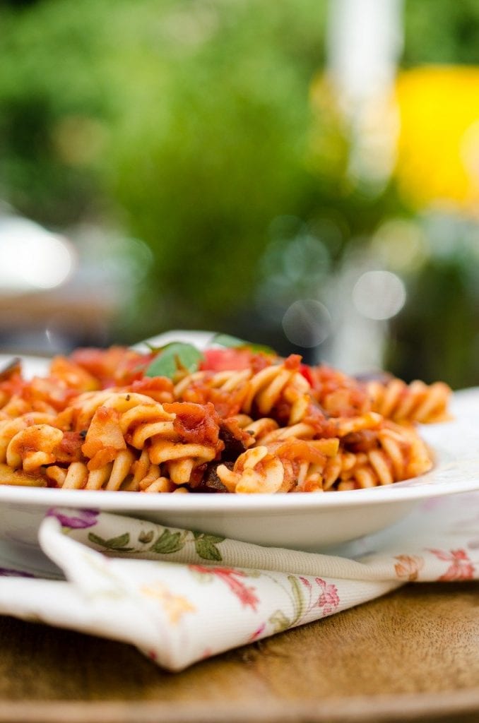 rotini pasta in a tomato-based sauce