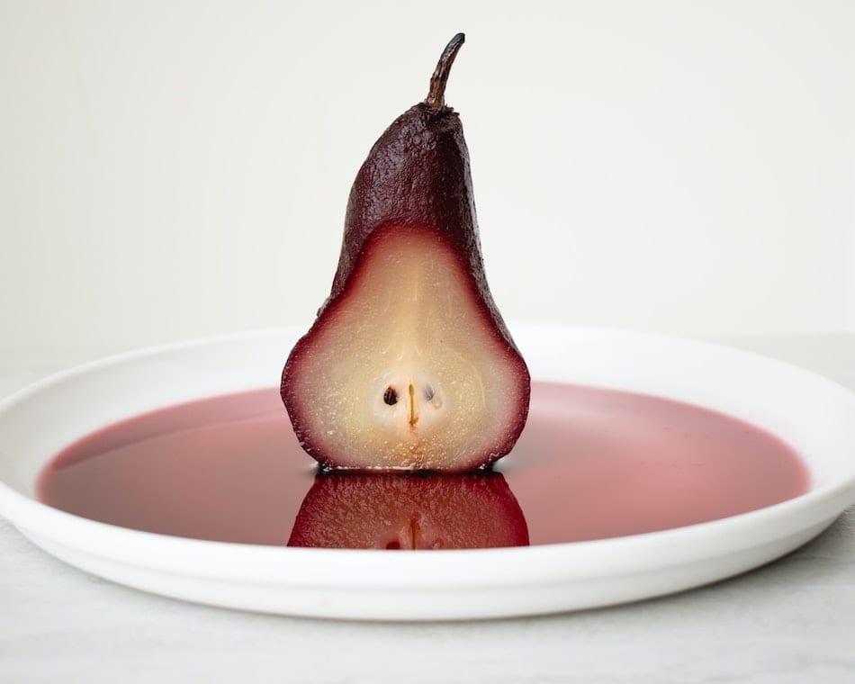 poached pears in mulled cranberry and sun dried cherry sauce