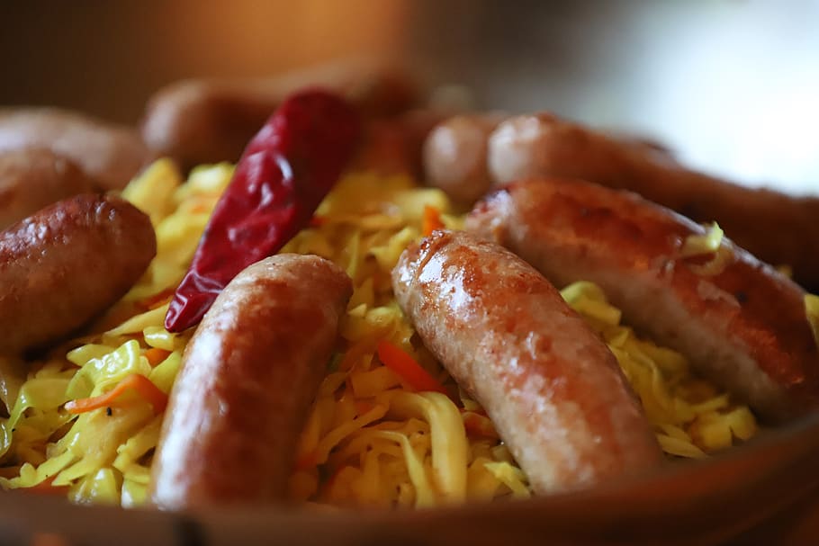 sausages on chopped cabbage