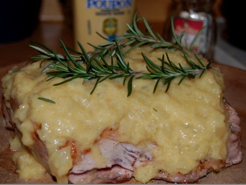 Pork Loin with Applesauce, Jelly, and Horseradish Recipe - Roasted pork loin glazed with a mixture of applesauce, redcurrant jelly, and horseradish, then garnished with rosemary sprigs