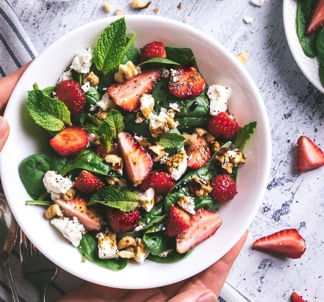 strawberry, chicken, and pecan spinach salad parfaits with brown sugar-bacon vinaigrette
