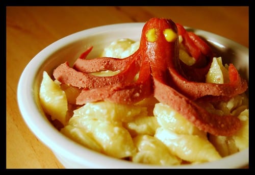 hotdog octopie on top of mac and cheese