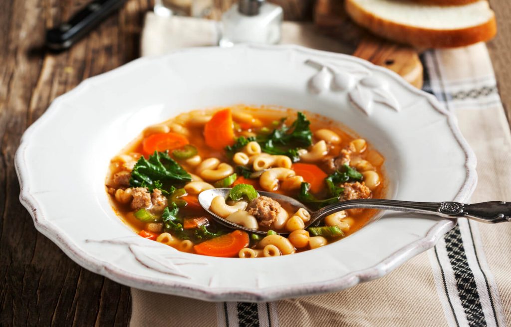 Italian Sausage Soup Recipe, Soup with carrots, greens, beans, and sausages