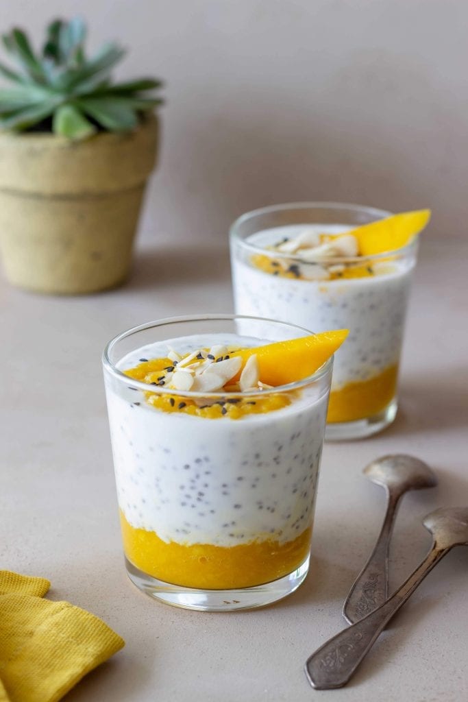yellow and white layered dessert with chia seeds