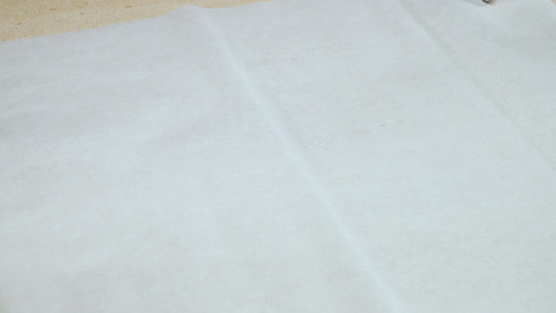 place parchment paper on a table