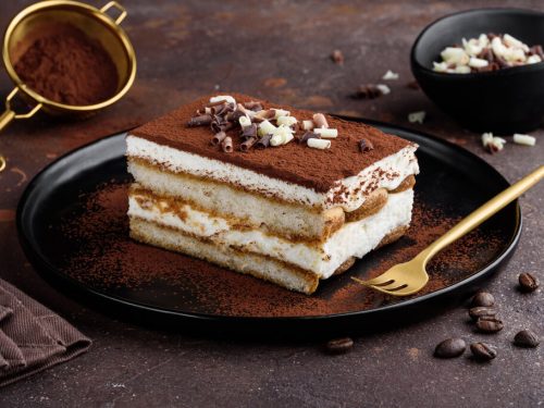Tiramisu Cake Recipe, Tiramisu cake dessert decorated with cocoa powder and white and dark chocolate curls