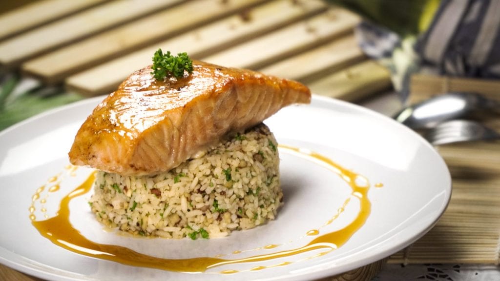 Citrus Glazed Salmon with Pecan-Citrus Rice Recipe - Baked salmon fillet with sweet lemon and honey glaze and orange flavored rice with toasted pecans