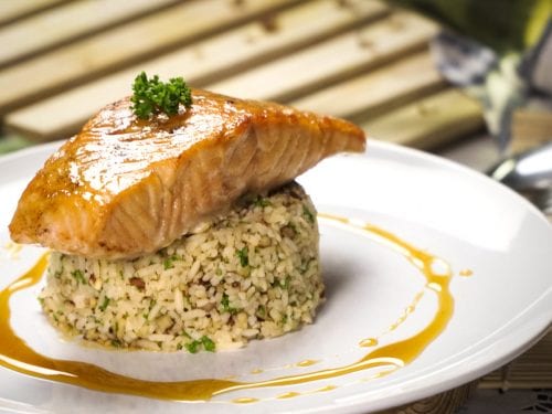 Citrus Glazed Salmon with Pecan-Citrus Rice Recipe - Baked salmon fillet with sweet lemon and honey glaze and orange flavored rice with toasted pecans