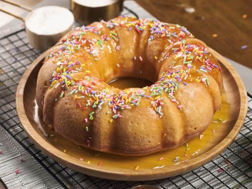 bundt cake with rainbow sprinkles and lemon syrup