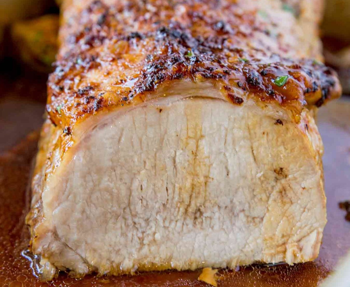 Ultimate Garlic Pork Loin Roast Recipe - Succulent roast pork loin rubbed with basic spices including garlic, paprika, salt, and pepper.