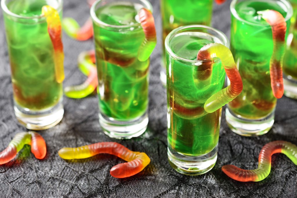 Wormy Swamp Punch Recipe, Halloween green swamp juice cocktail with gummy worms