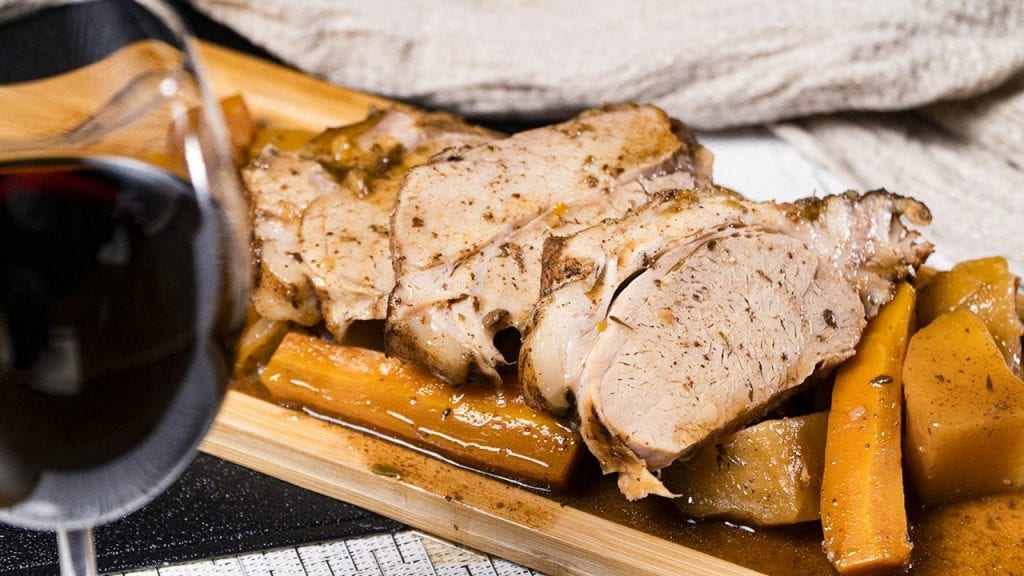Crock Pot Pork Roast Recipe, Pork roast served with carrots and wine