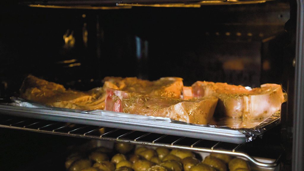 Preparing the Pork Steak with Seasoned Potatoes Recipe