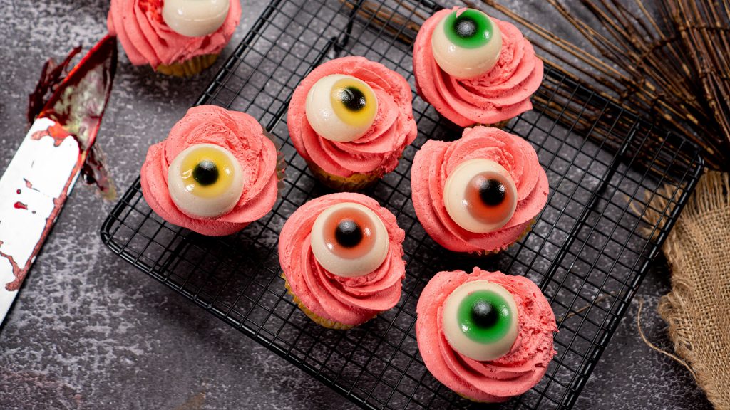 Spooky Delights Halloween Cupcakes, Cupcakes with red frosting and gummy eyes