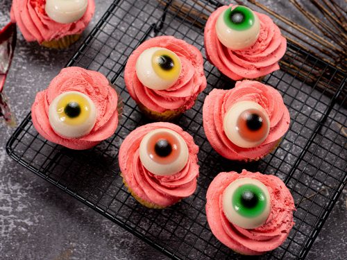 Spooky Delights Halloween Cupcakes, Cupcakes with red frosting and gummy eyes