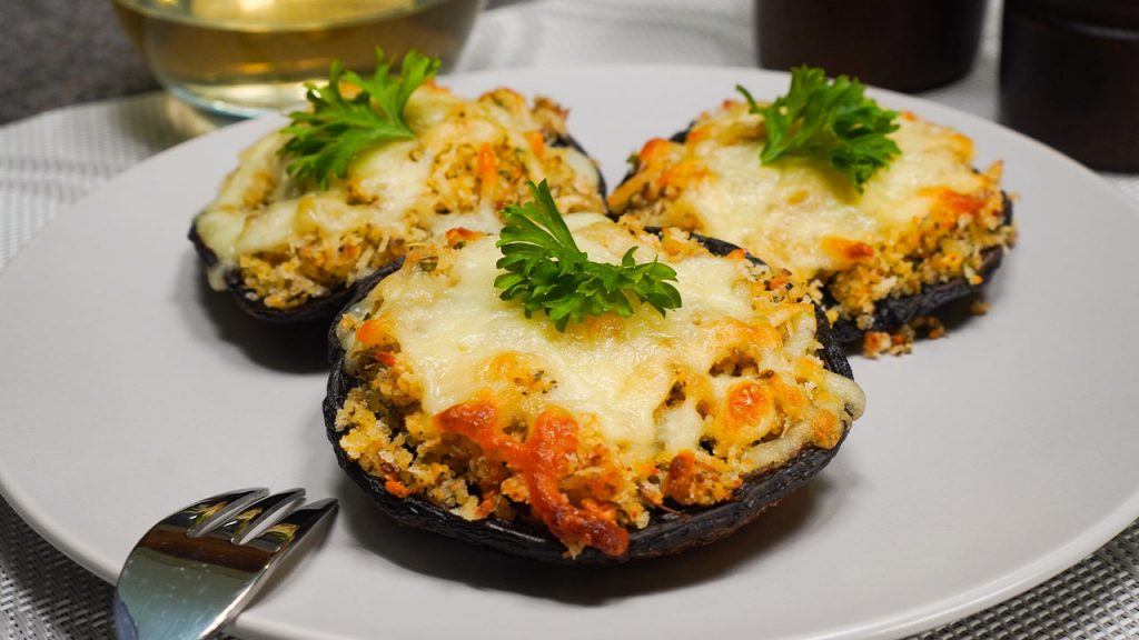 Cheesecake Factory's Stuffed Mushrooms Recipe, homemade stuffed mushrooms topped with mozzarella and parmesan cheese