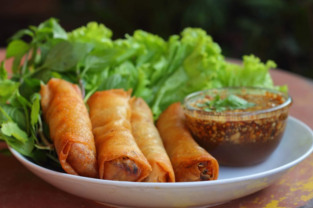 spring rolls with nuoc cham and fresh herbs