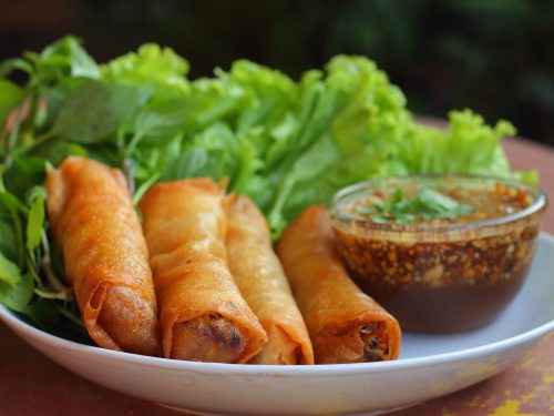 spring rolls with nuoc cham and fresh herbs