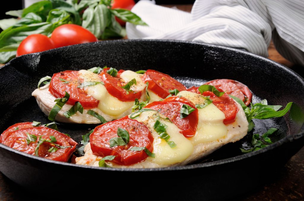 Chicken a la Caprese on an iron skillet