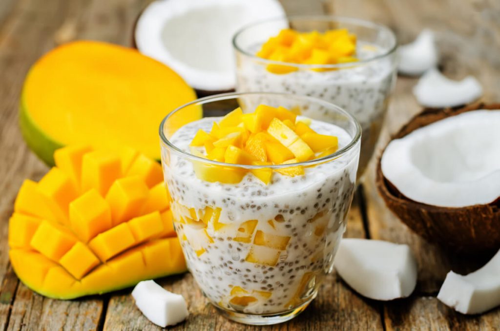 mango coconut chia pudding in a glass