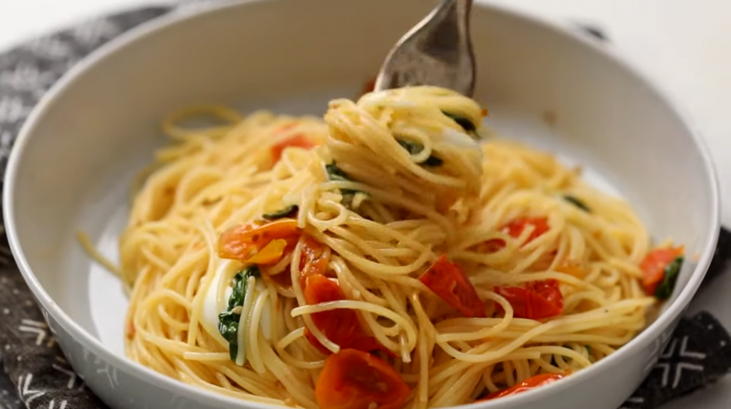 garlicky-pasta-with-burrata-basil-and-burst-cherry-tomatoes-recipe