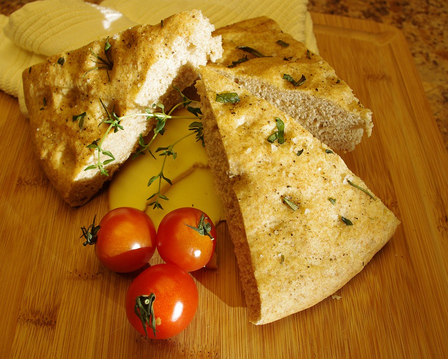 rosemary focaccia bread with cherry tomatoes and cheese