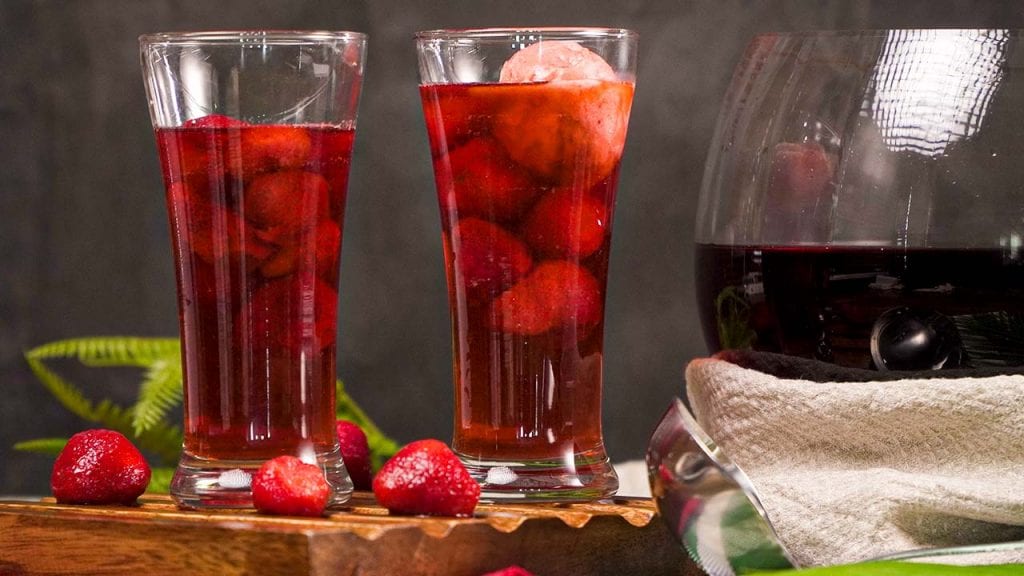 Heart-shaped fruit punch-flavored ice cubes in soda glasses