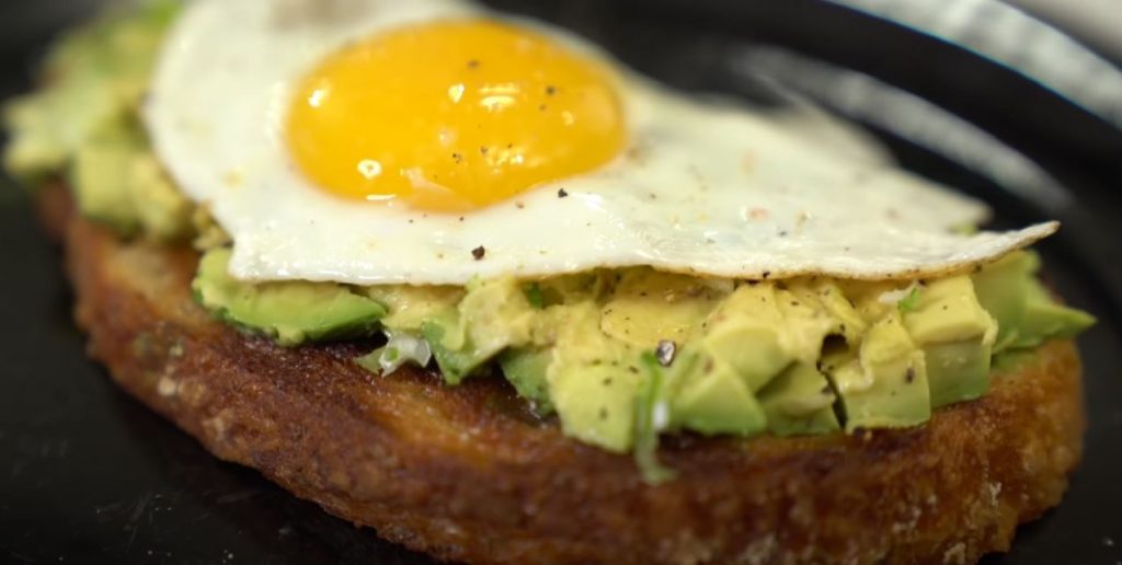 Avocado Toasts with Fried Egg, Olives, and Smoked Paprika Recipe