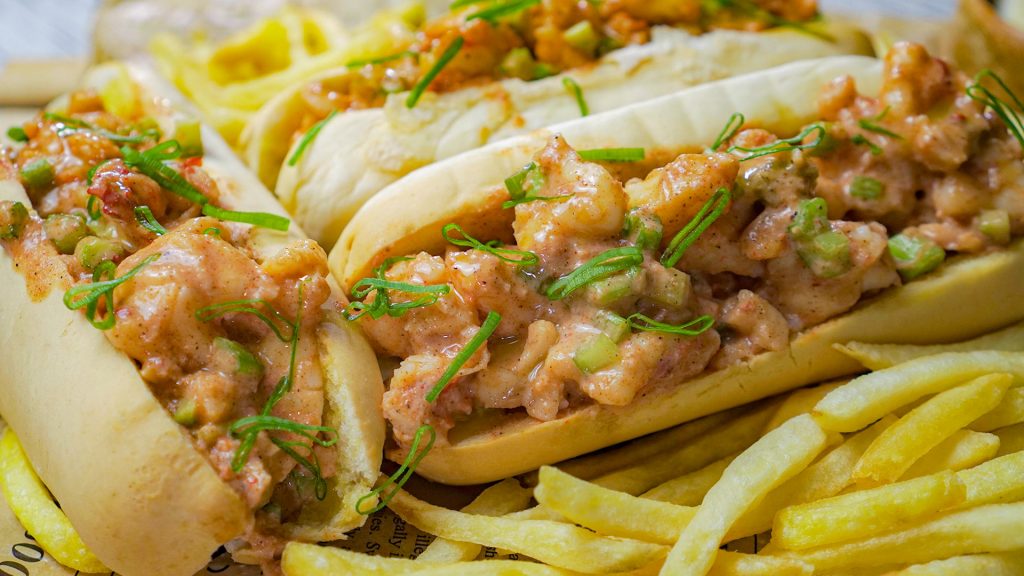 Lobster Roll Recipe, Hotdog buns filled with lobster and yogurt, topped with green onions and served with fries